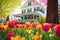 a dutch colonial home beside a tulip field