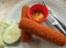 Dutch croquettes with fork and cucumber