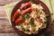 Dutch cuisine: stamppot from potatoes, sauerkraut and carrot close-up. horizontal top view