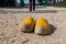 Dutch culture yellow wooden shoes footwear lying on sand floor