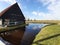 The Dutch Dutch suburb of Zaansche Schans. The water channels, the serene climate and the typical windmills