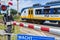 Dutch electric train going through crossing