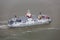 Dutch ferry boat at Wadden Sea navigating beween sandbanks