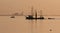 Dutch fishing ship sailing home in sunset