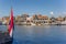 Dutch flag in front of the harbor of Volendam