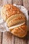 Dutch food: Tiger bread sliced close-up. vertical