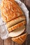 Dutch food: Tiger bread sliced close-up. Vertical top view