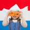 Dutch girl with orange donuts and Netherlands flag