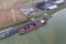 Dutch harbor Eemshaven with wind turbines and and freighter transporting coals