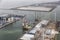 Dutch harbor Eemshaven with wind turbines and offshore construction platforms