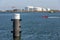 Dutch harbor Vlissingen with steel bollard and oil storage tanks