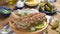 Dutch herring. Toast with Dutch herring, onions, pickles. Traditional rustic appetizer with seafood. Popular food in the