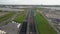 Dutch highway near Amsterdam Zeeburg A10 exit S114 and a small traffic jam aerial view.