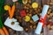 Dutch holiday Sinterklaas background with children shoe, carrots for Santa`s horse, gifts, traditional sweets pepernoten and