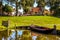 Dutch landscape. Old rowing boat with houses and a clothesline in the background