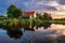 Dutch landscape with windmill at dramatic sunset, Zaandam, Amsterdam, Netherlands