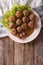 Dutch meat croquettes Bitterballen and mustard close up. vertical top view