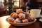 Dutch oliebollen with raisins in powdered sugar