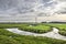 Dutch polder under a dramatic sky