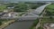 Dutch railroad metal and concrete suspension bridge infrastructure. Train track overpass aerial overhead drone view