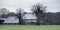 Dutch rural winter landscape with farm house.