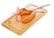 Dutch smoked sausage on a wooden cutting board with knife and fork