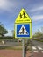 Dutch traffic road sign warning for a school zone.