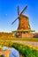 Dutch Travel Concepts. Traditional Dutch Windmill in the Village of Zaanse Schans at Daytime in the Netherlands