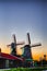 Dutch Travel Concepts. Two Traditional Dutch Windmills in the Village of Zaanse Schans at Daytime in the Netherlands