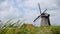 Dutch wind mill with grass landscape