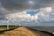 Dutch wind turbines and a cloudscape