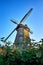 Dutch windmill behind a thorn bush, in Benz on the island of Usedom. Germany