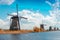 Dutch windmills with canal reflections at Kinderdijk, Netherlands