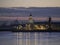 Duwn city center. Spring evening in St. Petersburg. Ice on the Neva River. View of the Rastral columns and Cabinet of curiosities