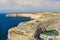 Dwejra is a lagoon of seawater on the island of Gozo. Aerial view of Sea Tunnel near Azure window. Mediterranean sea. Malta