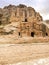 Dwellings carved into the stone cliffs of ancient Petra