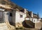 Dwellings houses-caves built into mount. Chinchilla