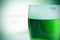Dyed green beer and text happy saint patricks day