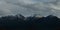 Dying sunlight on snow capped mountain peaks near Bokonbayevo, Kyrgyzstan, a popular centre for Community Based Tourism