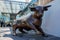Dynamic Bull Sculpture in Birmingham, UK with Modern Urban Backdrop