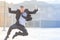 Dynamic businessman jumping outdoor