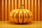 Dynamic display Abstract podium, 3D pumpkin on vibrant orange backdrop