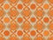 Dynamic Harmony: Repeated Orange Geometric Pattern