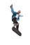 Dynamic image of young man in casual clothes in motion, training, skateboarding isolated over white background