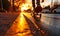 Dynamic low-angle view of a person skateboarding down an urban street at sunset, capturing the essence of freedom and youth