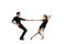 Dynamic portrait of young emotive dancers in black outfits dancing ballroom dance isolated on white background. Concept