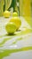 Dynamic Tennis Ball Swirls: Vibrant Paint Capturing Movement