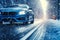 Dynamic winter ride, Blue car moves fast on snowy road, snowflakes and motion blur