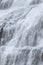 Dynjandi Waterfall Water Texture. Beautiful Pure Nature in Iceland. Powerful Mountain River Background. Huge Water