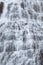 Dynjandi Waterfall Water Texture. Beautiful Pure Nature in Iceland. Powerful Mountain River Background. Huge Water